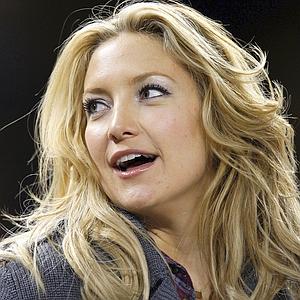 Actress Kate Hudson watches the MLB American League Division Series playoff baseball game between the New York Yankees and Minnesota Twins in New York